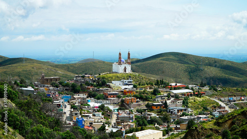 Church on a hill in a mexican town, towns of mexico, zacatecas mexico  photo