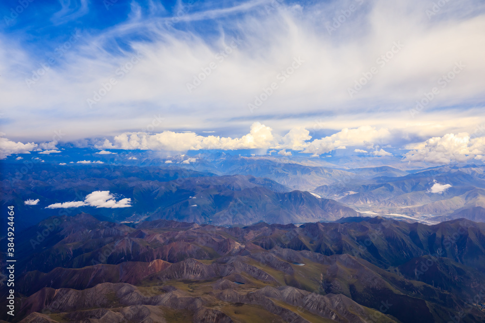 Aerial view of mountain and clouds scenery in Tibet,China.