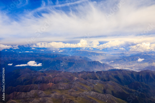 Aerial view of mountain and clouds scenery in Tibet,China. © ABCDstock