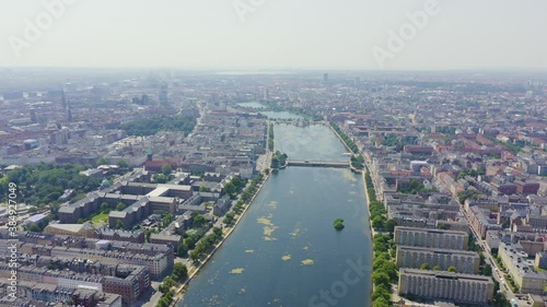 Dolly zoom. Copenhagen, Denmark. Central historical part of the city, city roofs and Copenhagen lakes. Aerial view, Aerial View, Departure of the camera photo