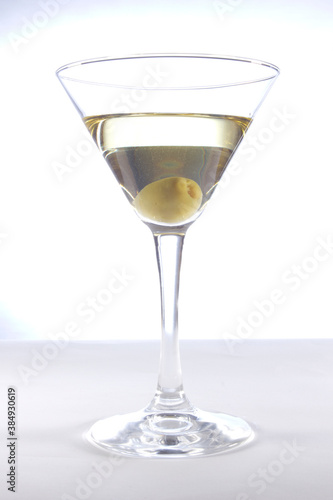 Glass with martini and olive
