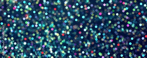 New year glitter festive banner. Dark green sparkling blur texture decorated red blue purple lights. Holiday night bokeh background.