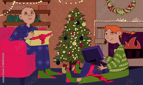 Kids react to bad gifts at Christmas evening, children disappointed over bad presents at holiday. Boy and girl in matching Christmas pajamas near decorated tree and fireplace unwrapping presents.