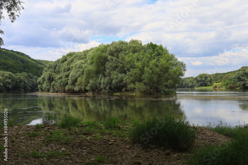 Very beautiful river water surface. Natural green background. photo