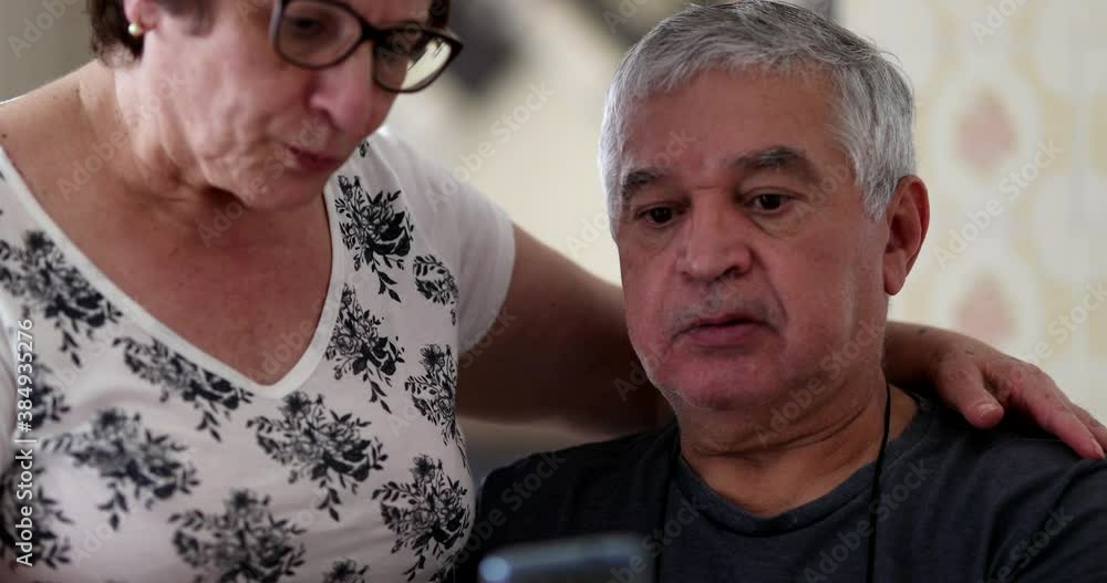 Worried older man seeking consolation by wife. Married senior couple struggling with old age Worried older man seeking consolation by wife. Married senior couple struggling with old age