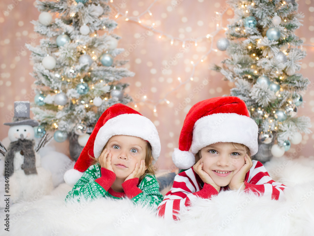 children in santa hats children in santa hats
