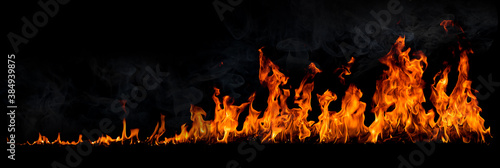 Fire flames with smoke on black background, Burning red hot sparks rise