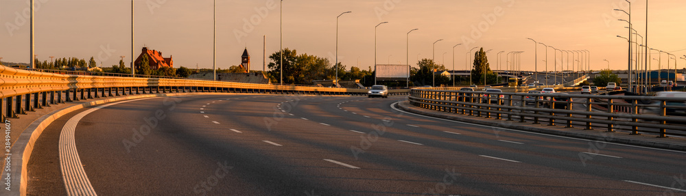 highway in the light of the setting sun