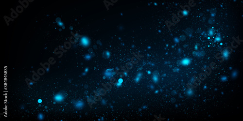 Vector abstract background with blue particles on dark. Glowing magical lights, sparkling glittering effect.