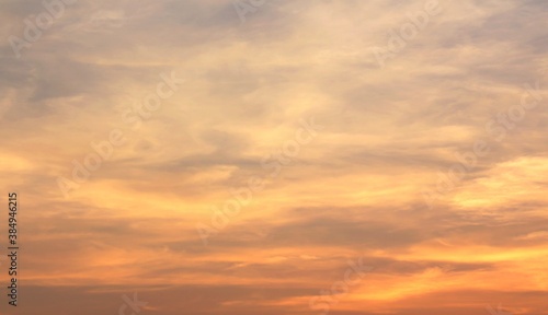 Clouds and sky with orange light at sunset in the season of Thailand. © Trin