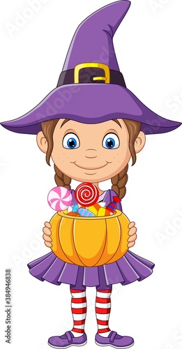 Cartoon little witch girl holds a pumpkin basket with Candies