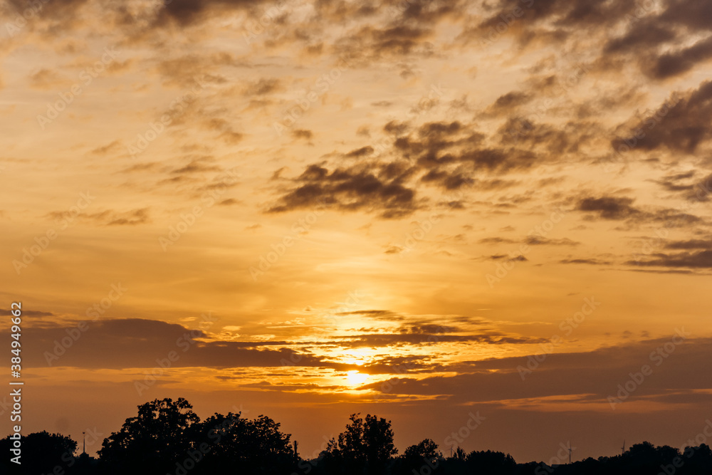 Beautiful sunset. Orange sunset. The moon at sunset Beautiful sunset. Orange sunset. The moon at sunset