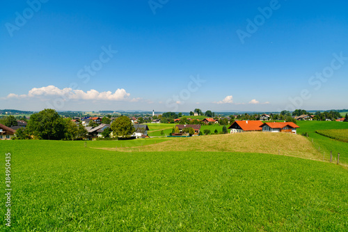 view from mountain kalvarienberg to the village of st.georgen im attergau, upper austria photo