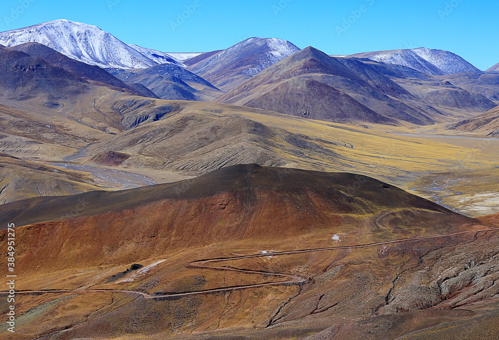 Naklejka premium mountains. snow peaks near the lake landscape