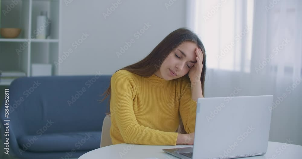 Stressed frustrated businesswoman wearing suffering from headache at work. Exhausted tensed worker coping with migraine, emotional stress concept feeling pain sitting at office desk with laptop. Stressed frustrated businesswoman wearing suffering from headache at work. Exhausted tensed worker coping with migraine, emotional stress concept feeling pain sitting at office desk with laptop.