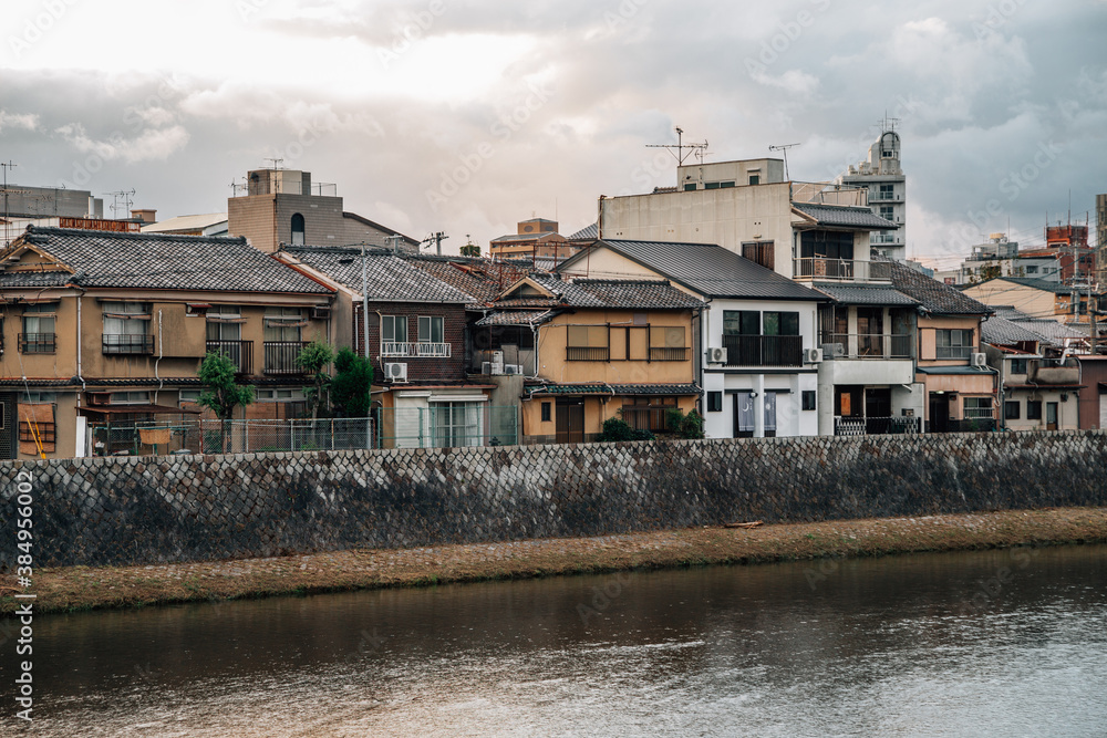 Old houses along the Kamo river in Kyoto, Japan
