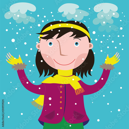 young woman rejoices at the first snow on a background of sky © Tatyana