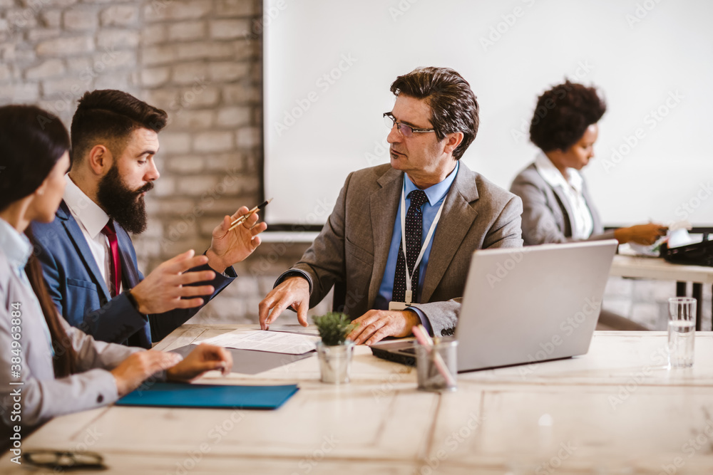 Meeting with agent in office, buying renting apartment or house, buyers of real estate ready to conclude a deal. Meeting with agent in office, buying renting apartment or house, buyers of real estate ready to conclude a deal.