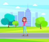 Young smiling girl wearing pink t-shirt and jeans, stylish shoes at heels. Fashionable woman with bob hairstyle walking in green park at urban view background. Cheerful girl posing, talking by phone