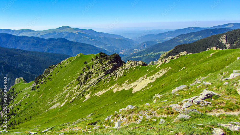 Pyrenees summer scenery in a summer and sunny day. Mountain range for hiking and trekking. Outdoor and adventure activities.