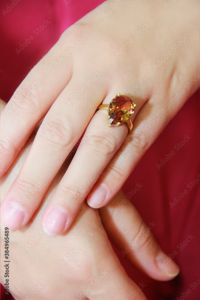 women's jewelry gold ring with a precious stone