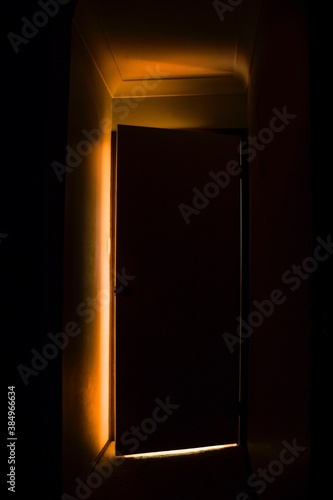 Light behind the door ajar