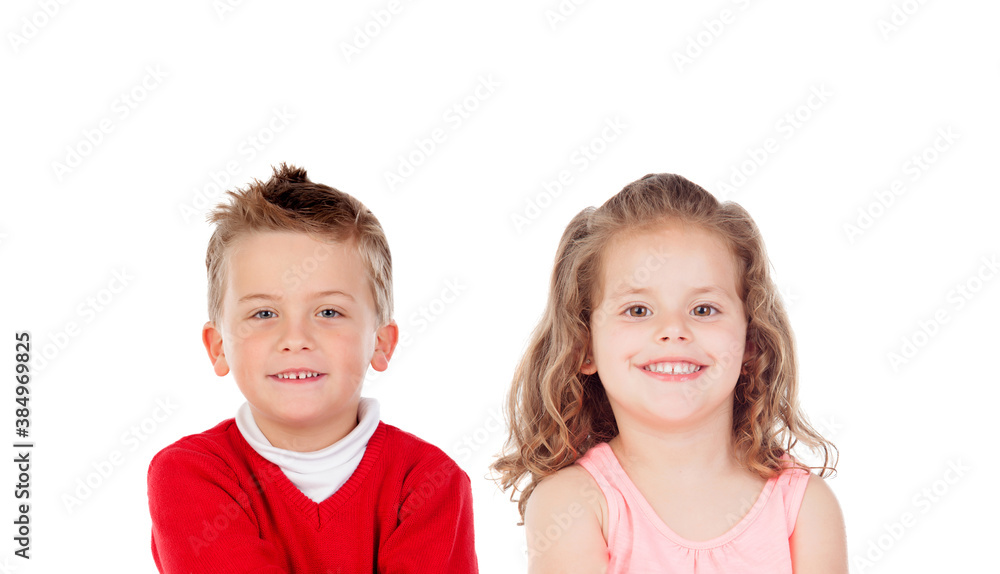Two funny siblings looking at camera Two funny siblings looking at camera