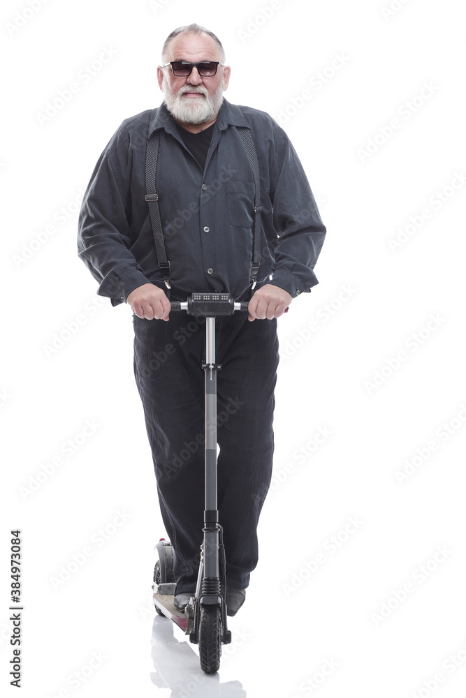 elderly man standing on electric scooter. isolated on a white elderly man standing on electric scooter. isolated on a white