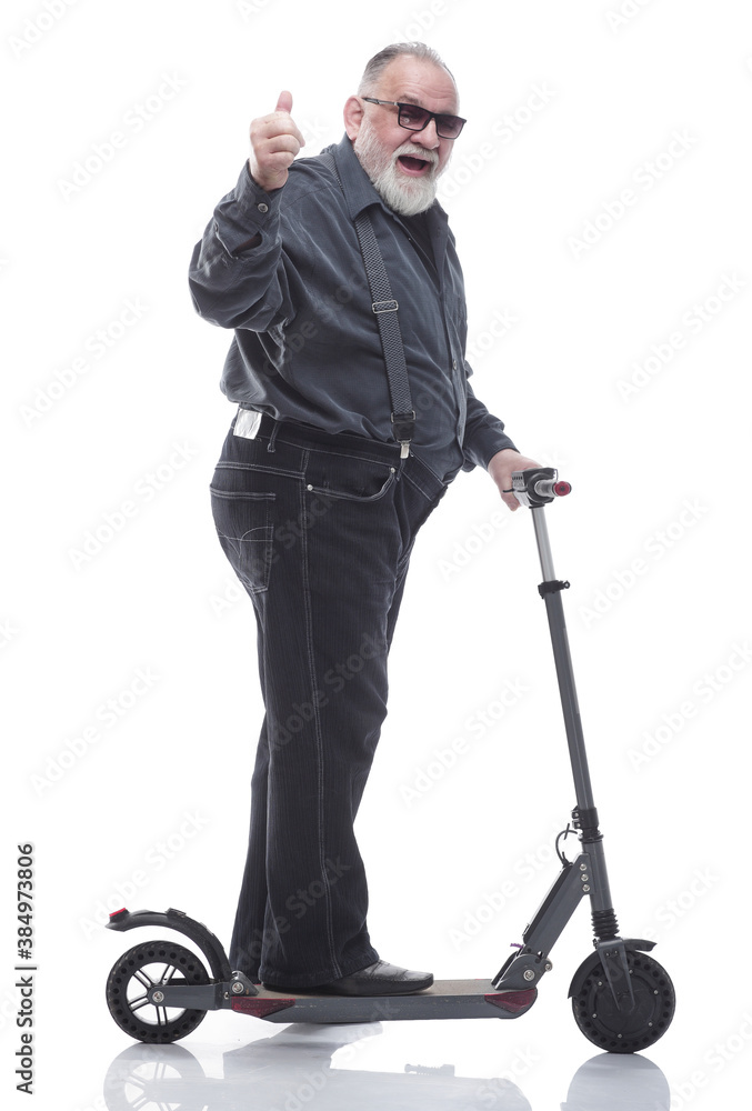 elderly man with an electric scooter shows the OK gesture elderly man with an electric scooter shows the OK gesture