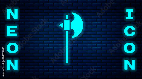 Glowing neon Medieval axe icon isolated on brick wall background. Battle axe, executioner axe. Medieval weapon. Vector.