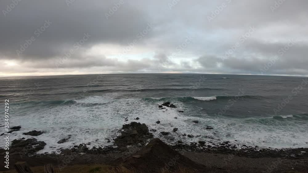 Clouds over Greenland sea in early autumn, rocky Iceland coast Clouds over Greenland sea in early autumn, rocky Iceland coast