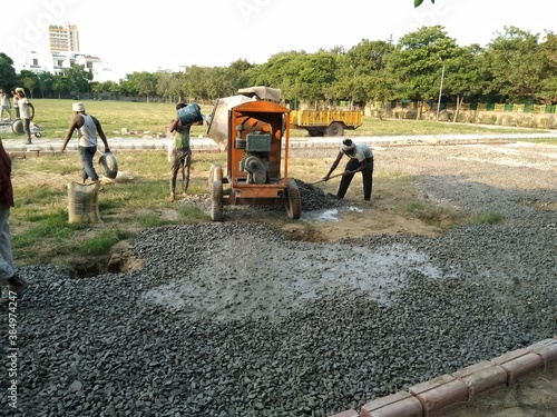 Utter pardesh , india - construction workers doing work , A picture of construction workers doing work in noida 11 september 2020 photo