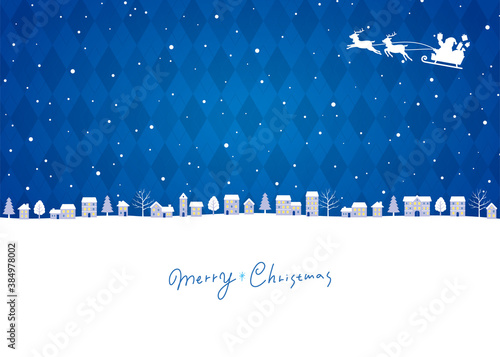クリスマスの街並み青背景、サンタクロースとトナカイのソリ