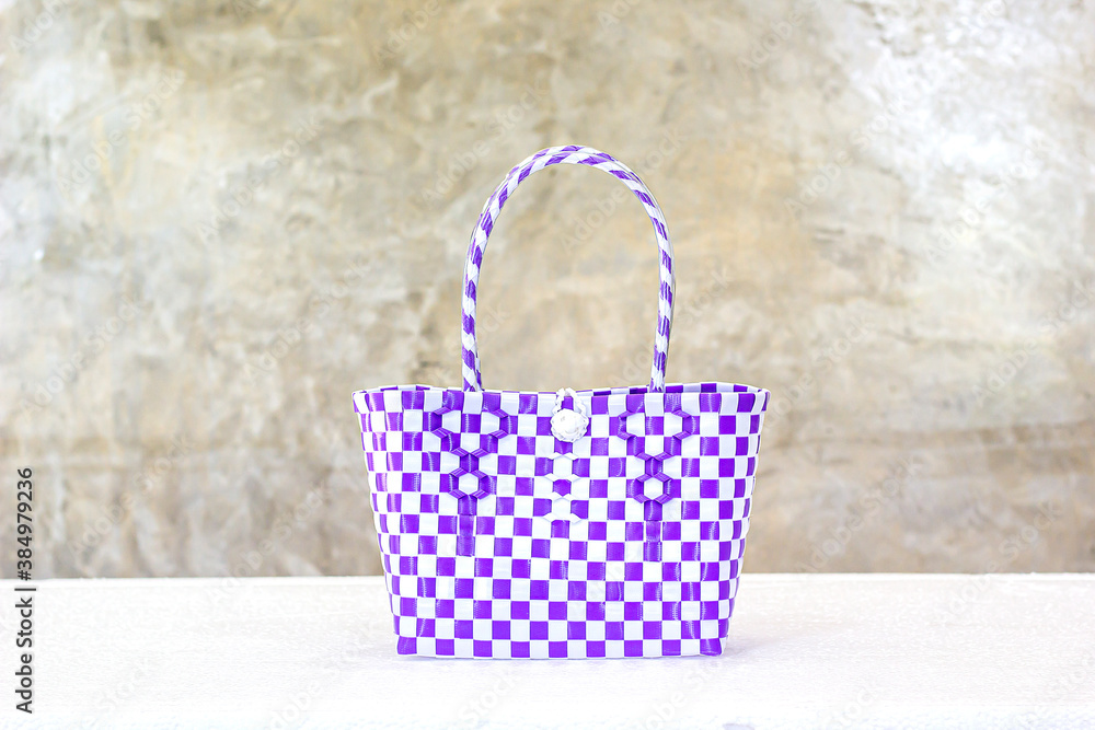 Plastic weave basket handmade on white background in Thailand Plastic weave basket handmade on white background in Thailand