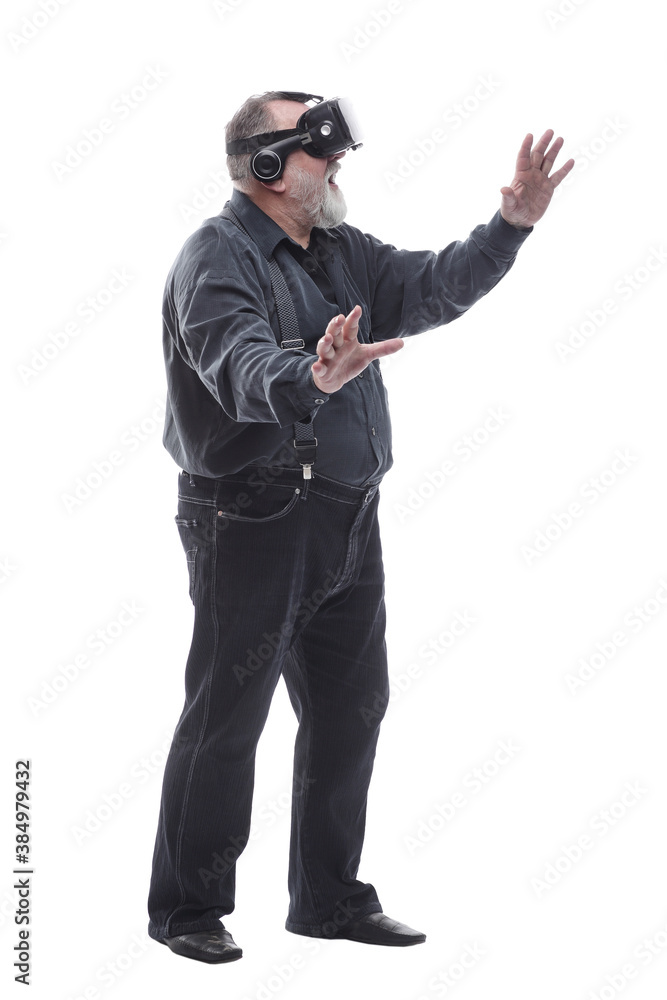 modern adult male in a virtual reality helmet. isolated on a white modern adult male in a virtual reality helmet. isolated on a white