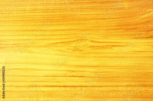 gold paint on wood background or texture