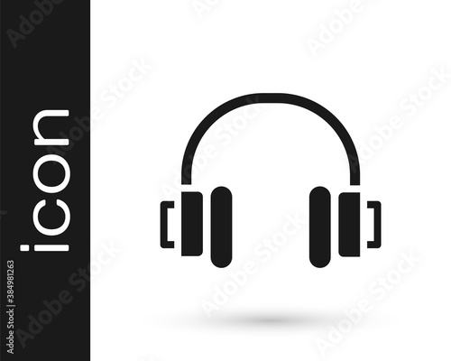 Black Headphones icon isolated on white background. Earphones. Concept for listening to music, service, communication and operator. Vector.