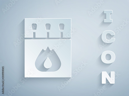 Paper cut Open matchbox and matches icon isolated on grey background. Paper art style. Vector.