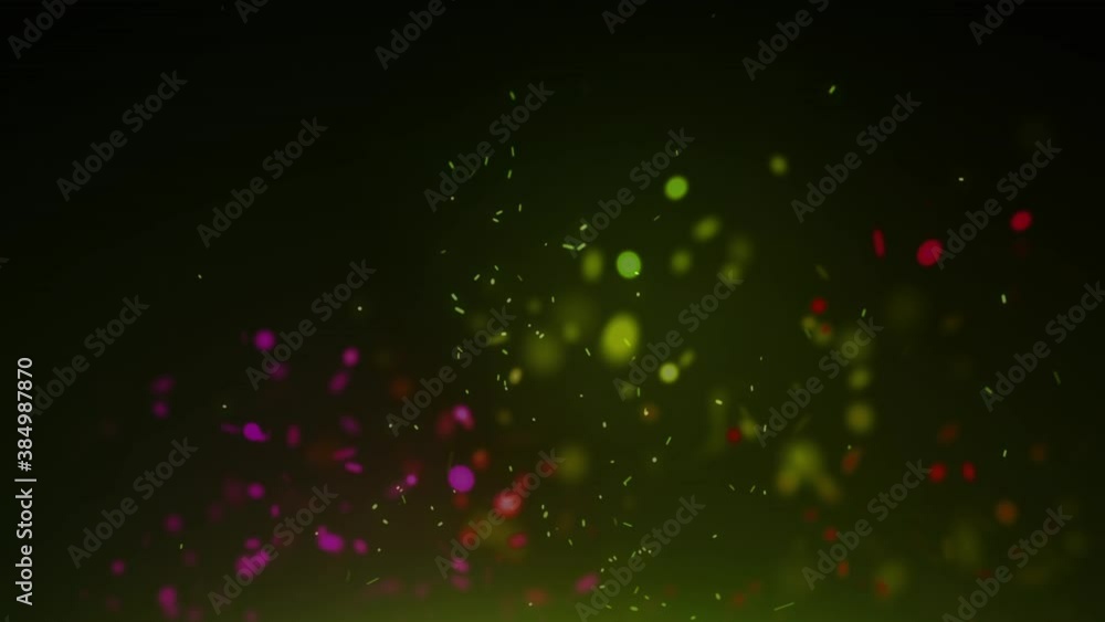 Green and purple spots of lights moving against black background Green and purple spots of lights moving against black background