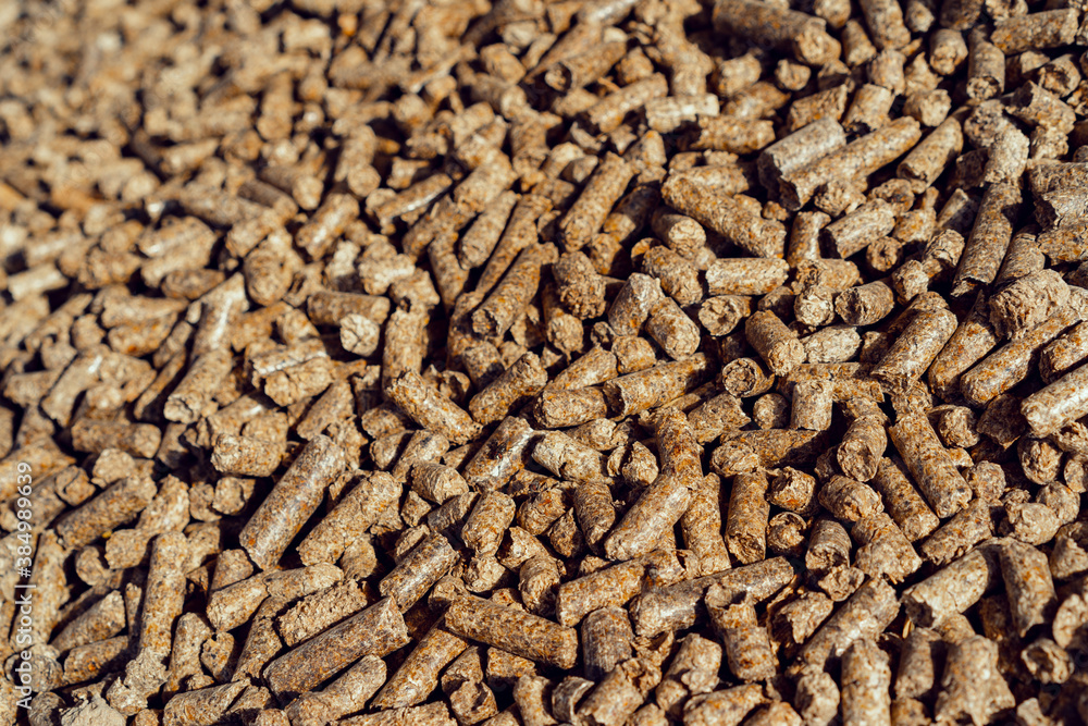 Large pile of compressed eco wood pellets Large pile of compressed eco wood pellets