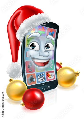 A cell or mobile phone Christmas mascot cartoon character with a Santa Claus hat on and gold and red bauble balls ornament decorations