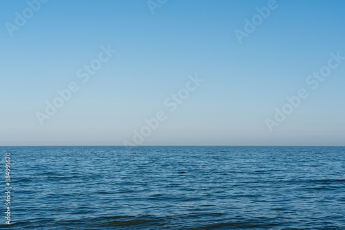 Fototapeta Naklejka Na Ścianę i Meble -  Calm sea with blue sky background
Aldeburgh, Suffolk. UK. Landscape