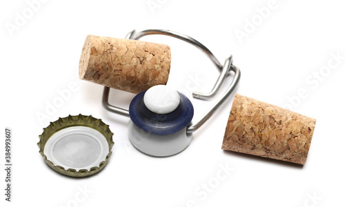 Traditional wine corks, plugs and bottle caps isolated on white background