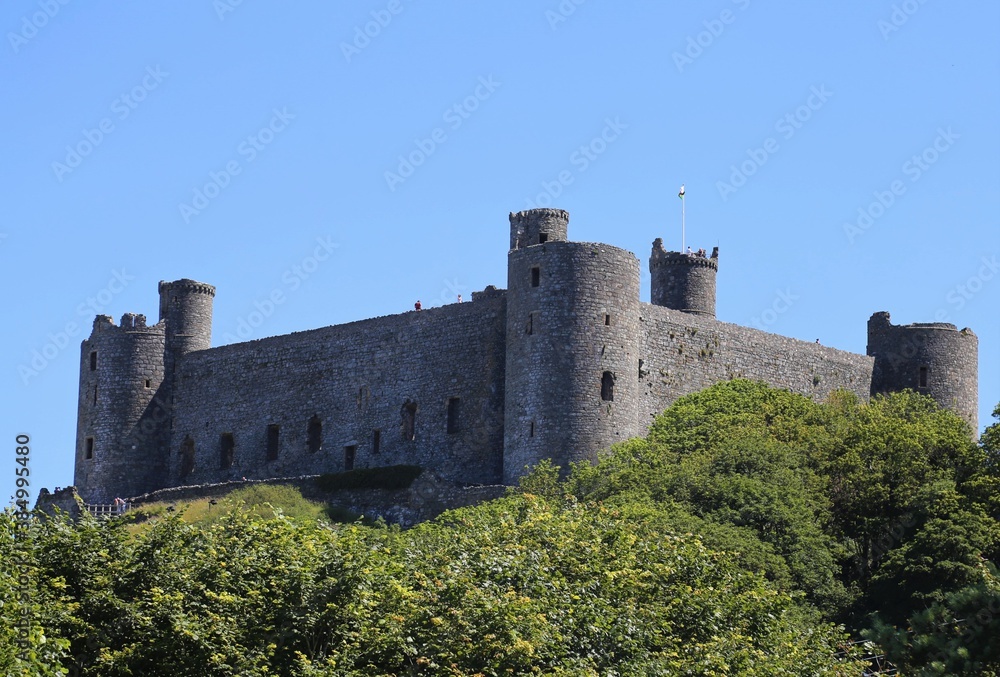 A view of the ancient Harlech Castle taken from below the walls in Gwynedd, Wales, UK.