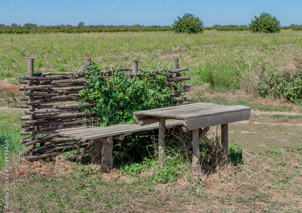 Resting place in the field. Table and bench. Resting place in the field. Table and bench.