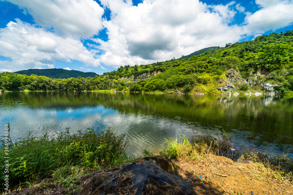 Nature landscape of Ba Be lake ( another name is Nui Da lake, May Nui lake ) in Ma Thien Lanh valley, Ba Den mountain, Tay Ninh province, Vietnam.