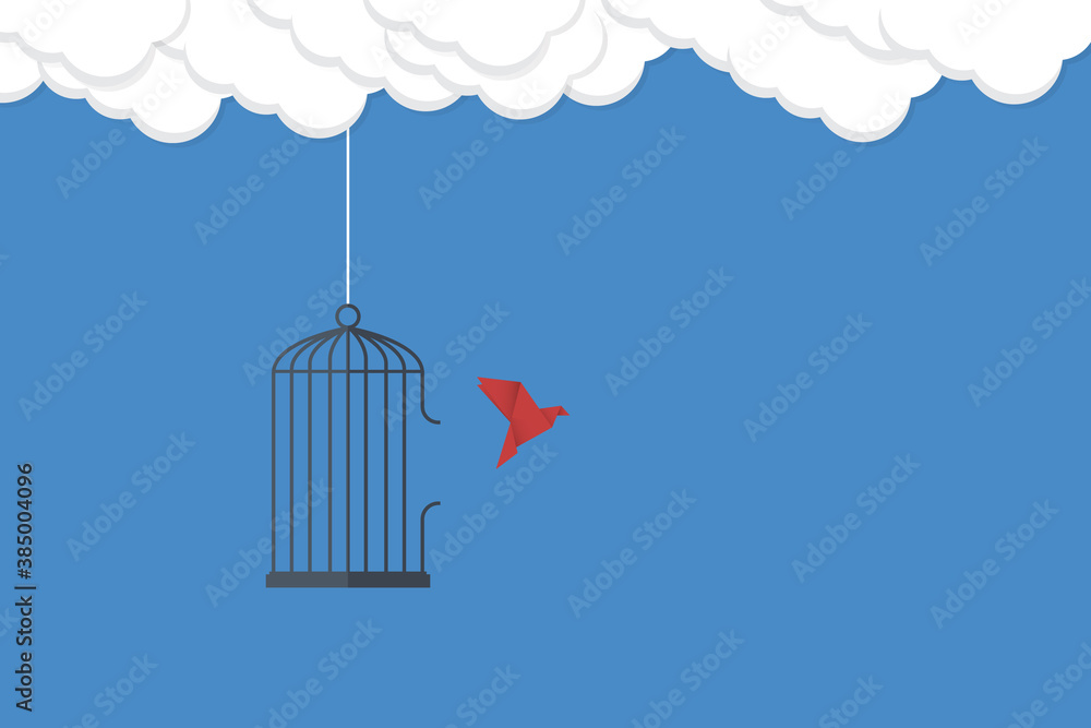 Flying bird and cage. Freedom concept. Emotion of freedom and happiness. Minimalist style.
