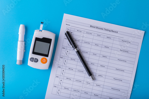 World diabetes day. National American diabetic awareness. Free Glucose Monitors on blue background. Healthcare and medical concept