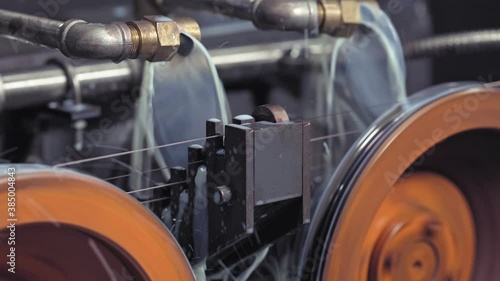 The drawing process of copper wire at the factory for the production of electric cable. 