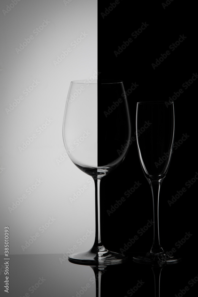 Two glass goblets on a gradient background
Two glass goblets on a gradient background